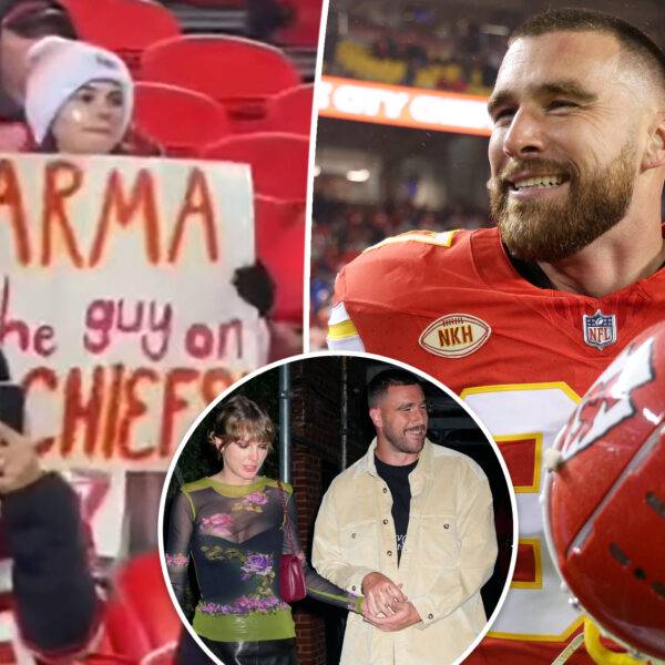 Travis Kelce has adorable reaction to fan’s ‘guy on the Chiefs’ sign as Taylor Swift misses his game in Kansas City